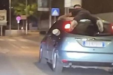 Të qëndrosh shtrirë mbi makinën që lëvizë 130 km/h, sfida e rrezikshme në rrjetet sociale (VIDEO)
